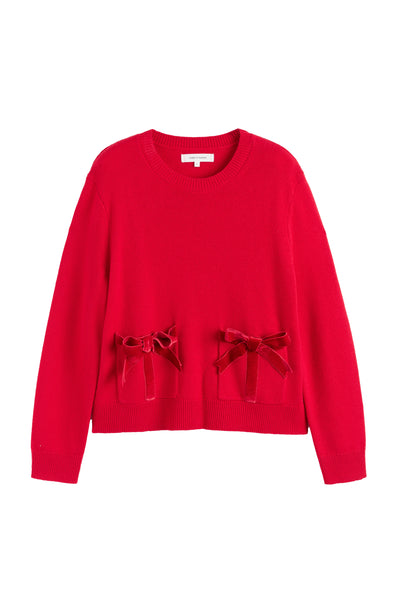 Red sweater with bow details on a white background