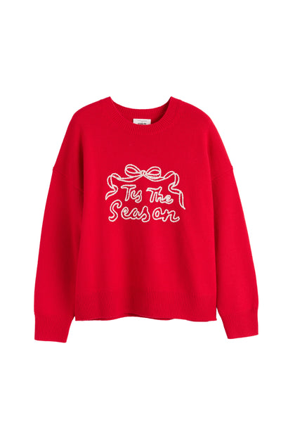 Red sweatshirt with white text on a white background