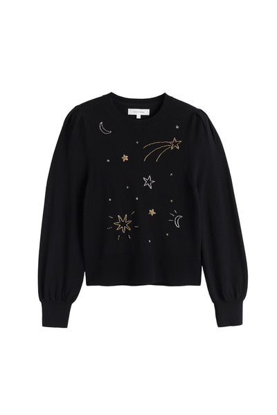Black sweater with celestial designs on a white background