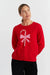 Person wearing a red sweater with a candy cane design on a white background