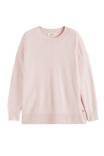 Pink sweater on a white background