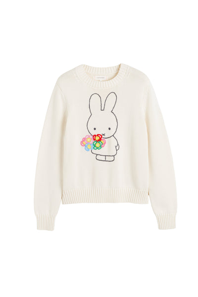White sweater with a cartoon bunny holding flowers on a white background