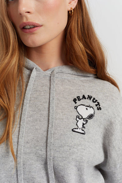 Grey hoodie with Peanuts logo worn by a person